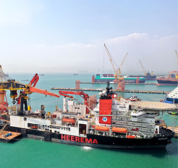 Heavylift and offshore windfarm maintenance vessel